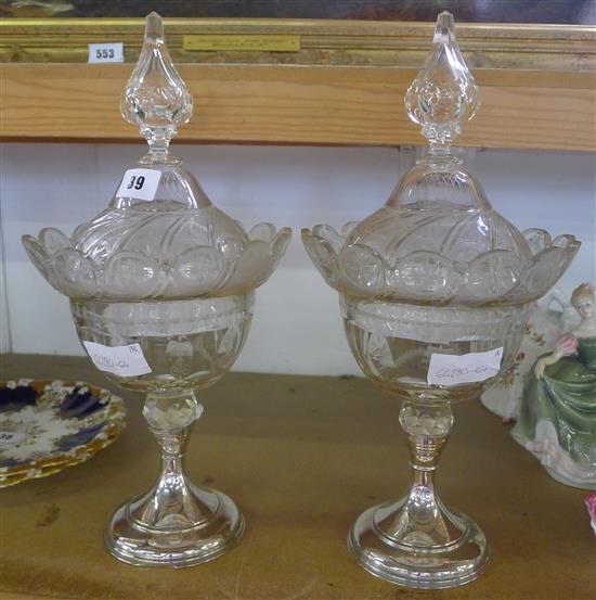 Pair of glass and silver vases with covers